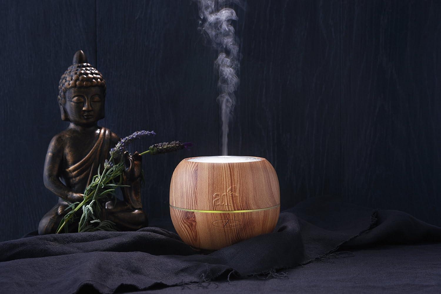 imageArtNaturals Aromatherapy Essential Oil Diffuser 135 Fl Oz 400ml Tank Ultrasonic Aroma Humidifier Adjustable Mist Mode Auto ShutOff and 7 Color LED Lights For Home Office ampamp Bedroom